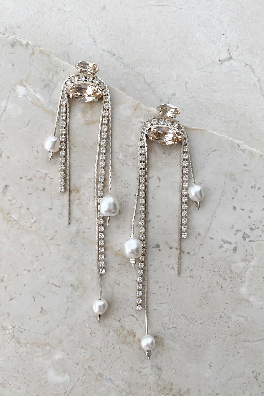 Kolczyki w kształcie łuku z perłami